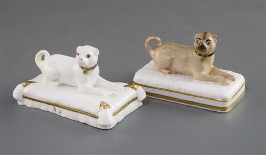 Two Minton porcelain figures of recumbent pug dogs, c.1831-40, L. 10.7cm and 9.3cm, slight faults